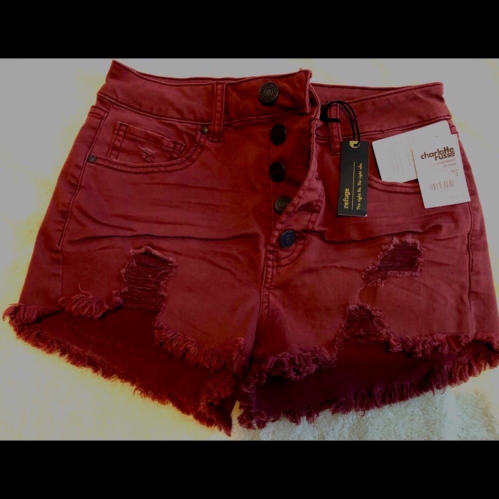 Charlotte Ruse woman’s wine/mahogany red distressed button front shorts size 2….